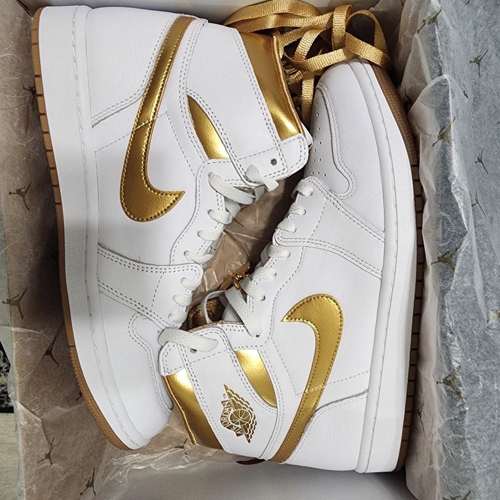 Gold and white Jordan 1 retro high